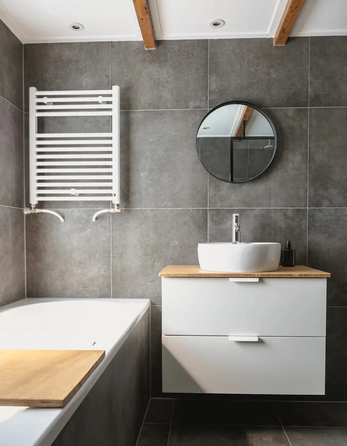 Modern white bathroom after plumbing refit