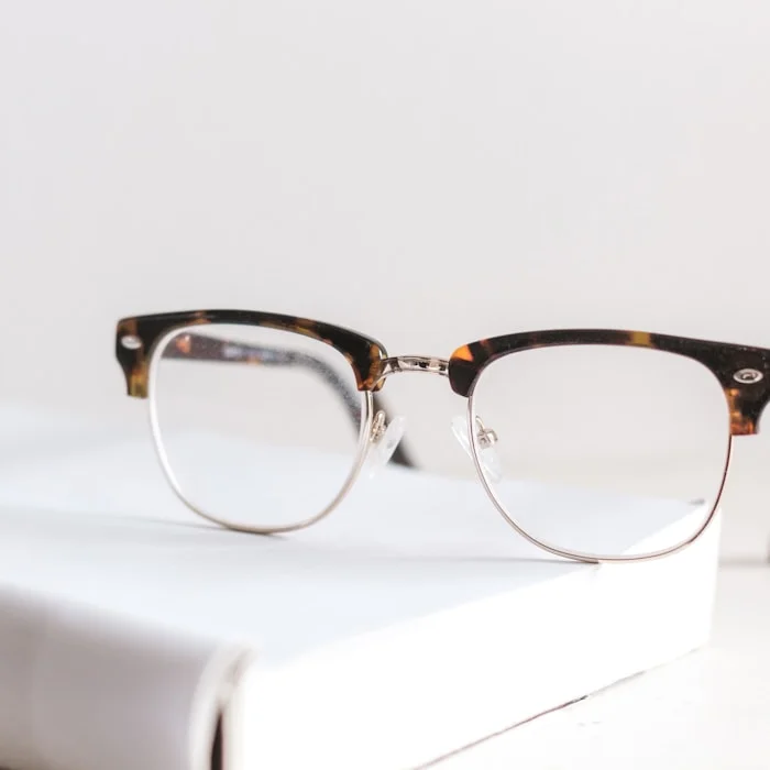 Competition swim goggles on white surface